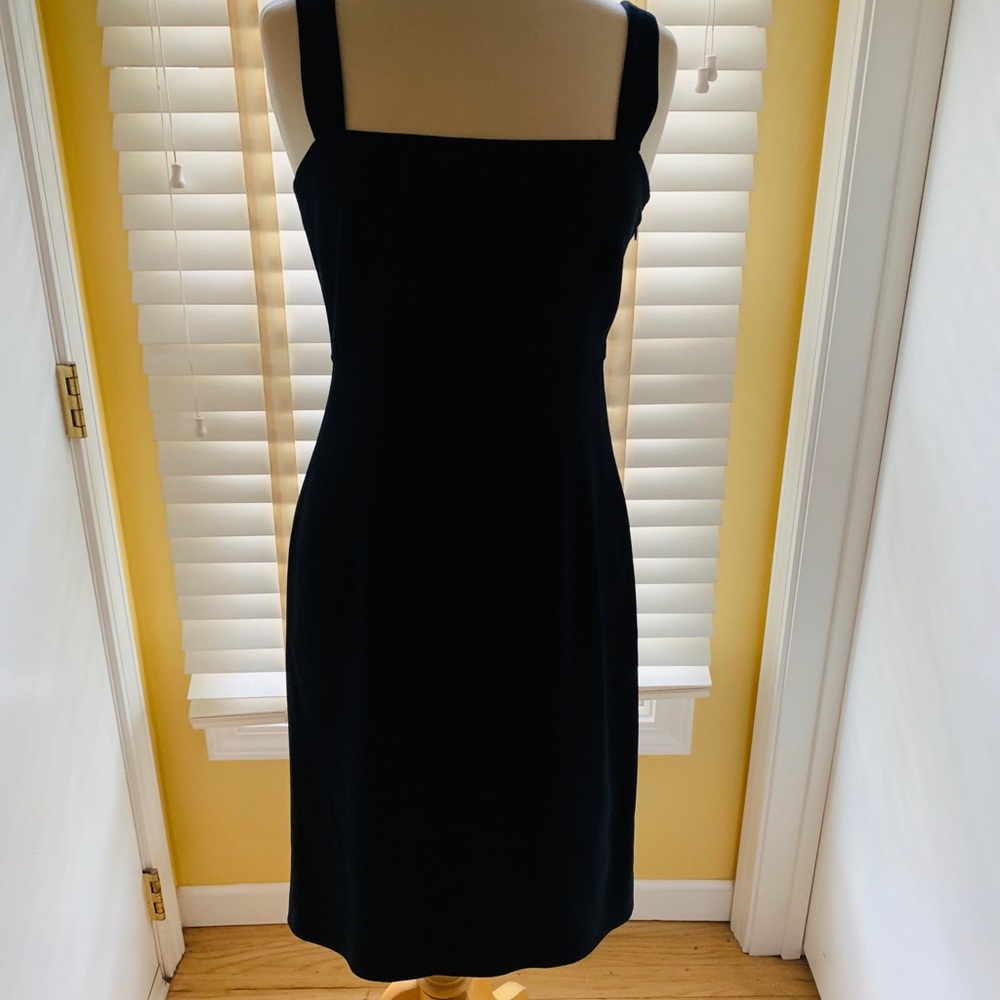 Giorgio Armani solid black sheath dress.